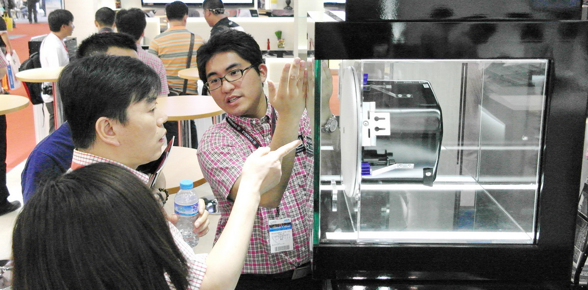 钱柜777专业音响新产品亮相PALM EXPO 2013展会 